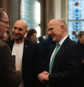 Härtel, Rauhe und Wegner bei einem Empfang.